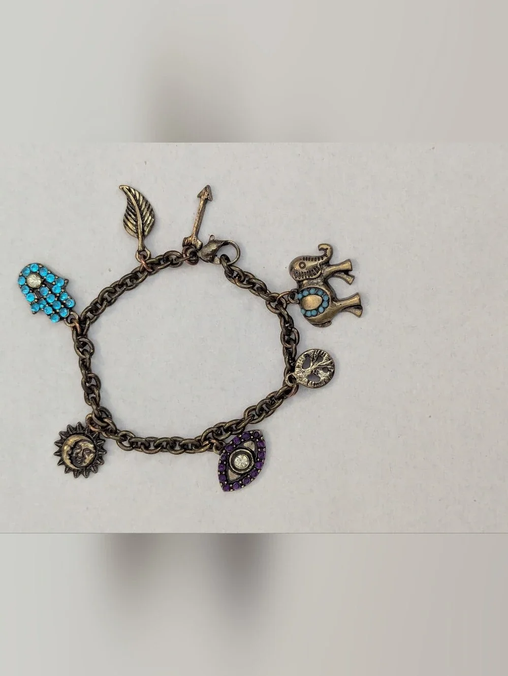 Vintage-Inspired Charm Bracelet with Turquoise and Purple Accents